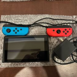  New Blue And Red Nintendo Switch With Wrist Strap