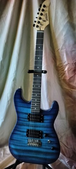 Brand new electric guitar with new bag and cable and shoulder strap