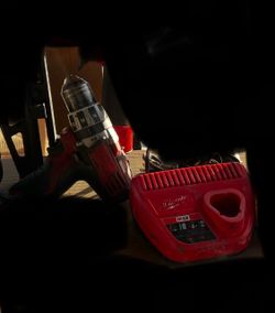 Milwaukee M12 Drill and Charger no battery sold as is