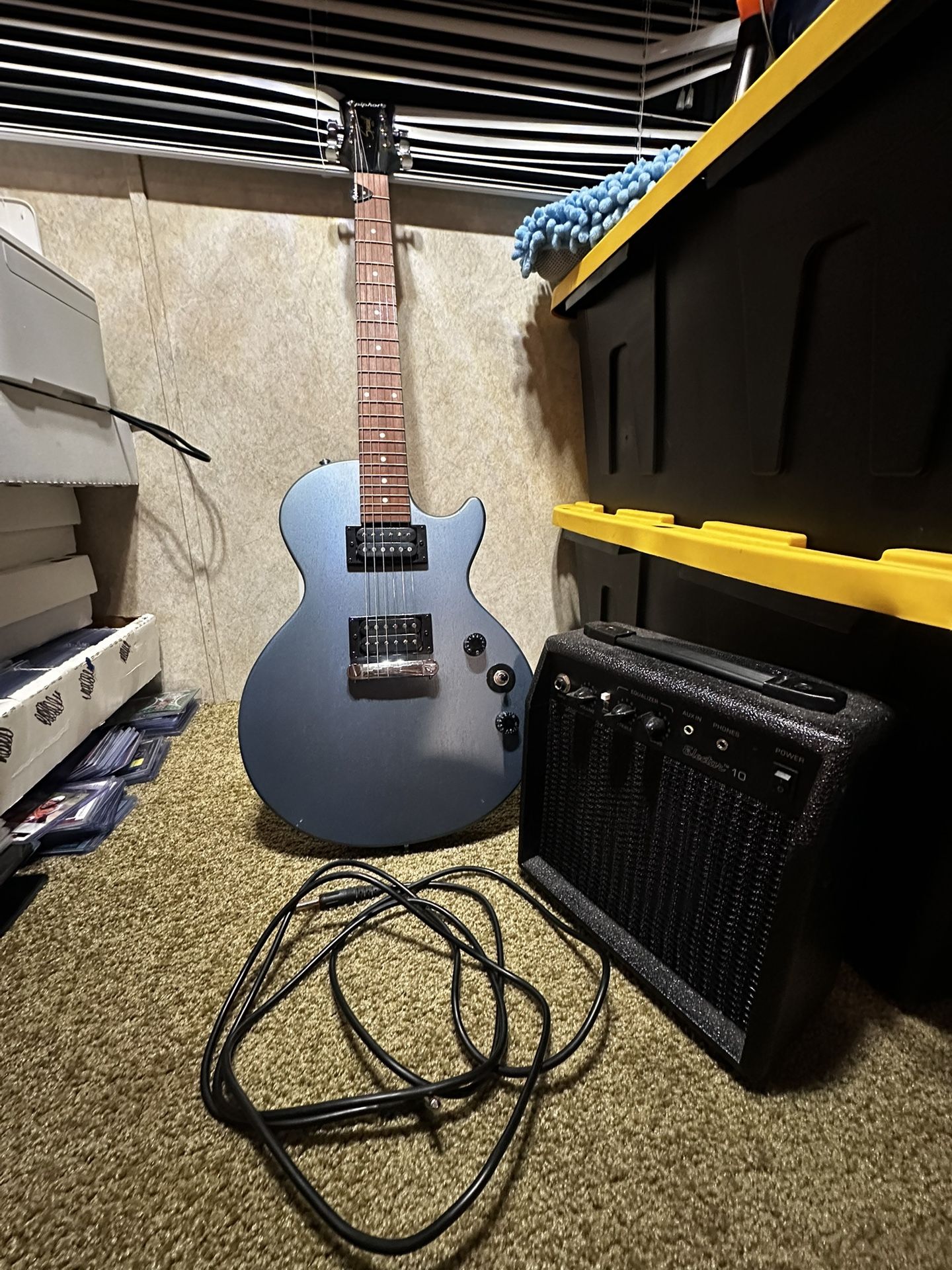 Blue Epiphone Electric Guitar with Amp and Pickup