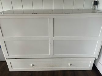 Murphy cabinet bed includes mattress