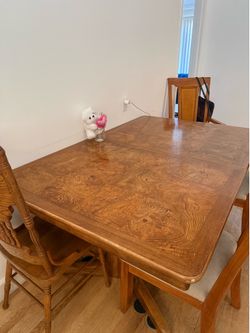 Wooden kitchen table with seats