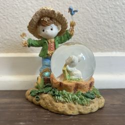 Precious Moments Figurine with Snow Globe