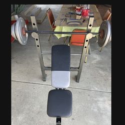 Weight Bench / Bar / Weights.     100 Dollars 