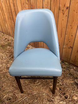 2 baby blue chairs
