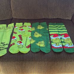 4 Pairs Of The Grinch Socks 