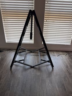 Black metal full-size bed frame