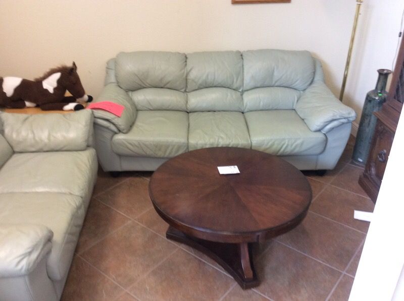 Mint green leather sofa and loveseat