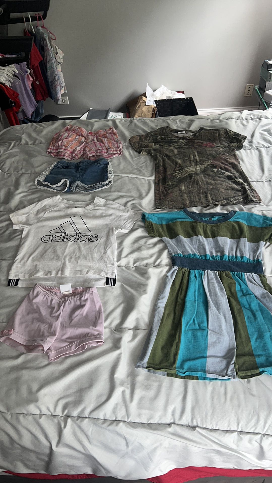 Girls 6/6x play clothes. Pink monkeybarbuddies shorts are size 5/6. Adidas shirt has stains. Joes jean shirt lace is frayed. Plaid shorts are lands en