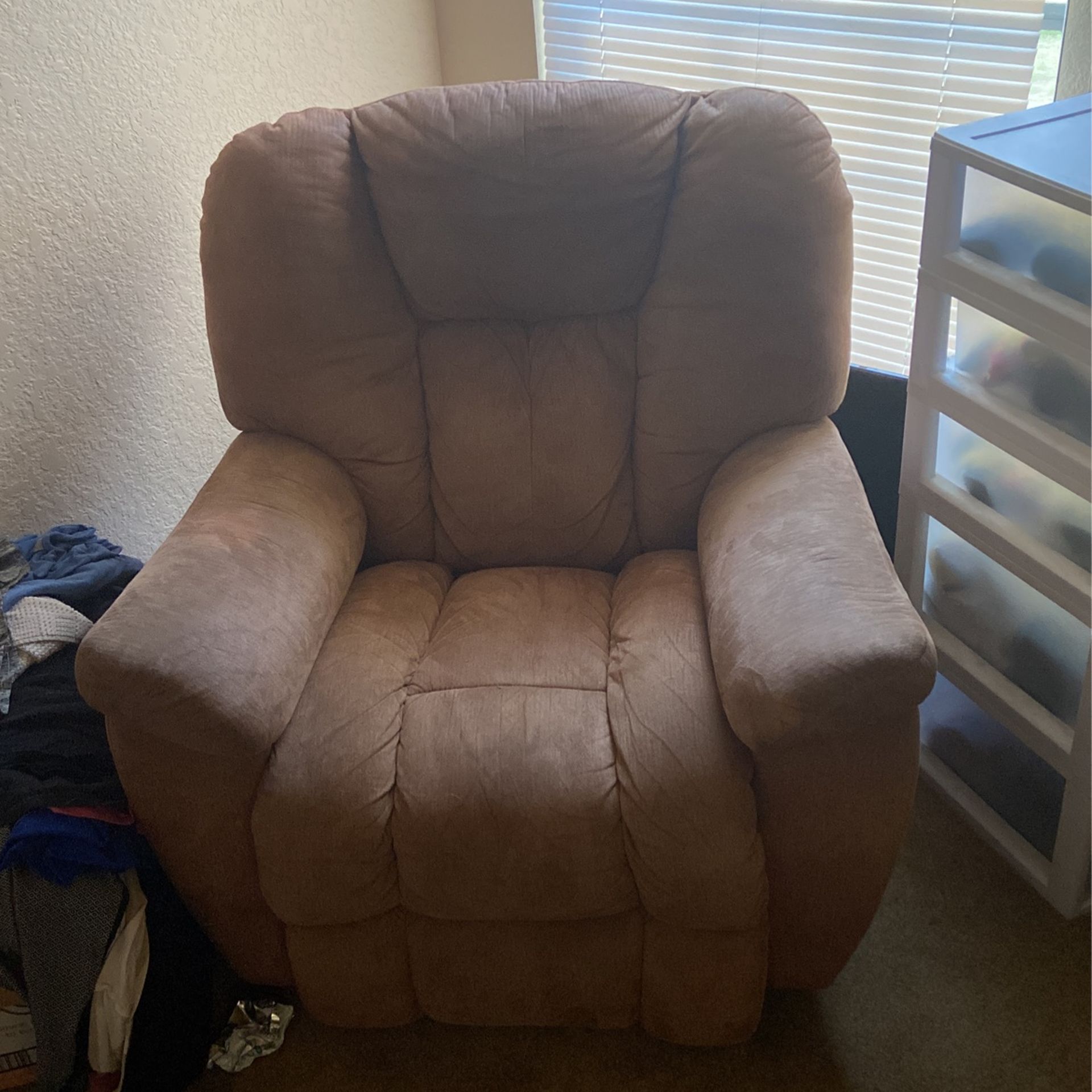 Brown velvet recliner chair