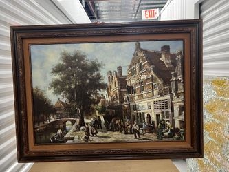 Painting With Wood Frame And Glass Covering