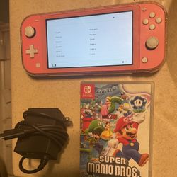 Nintendo Switch Lite  W/ Super Mario Bros Wonder 