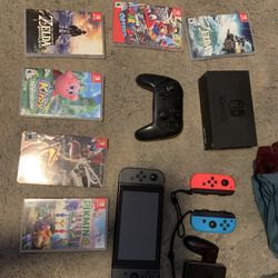 Nintendo Switch with games and controllers SEE DESC