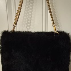 Nearly New Worn Once Nice Black Stylish Fur Bag With Stylish Hokd Strap Retal Price Is $100