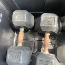 Two 50 pound dumbbells