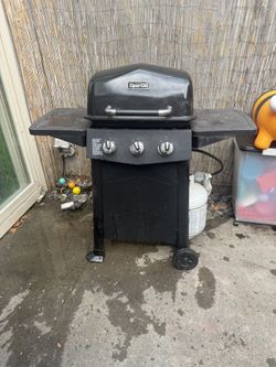 Bbq Including Cover And Empty Propane Tank