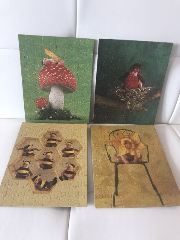 Anne Geddes puzzles, 3 sets plus 4 done