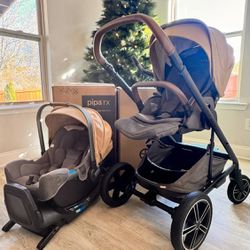 Nuna Stroller And Car seat With Base 