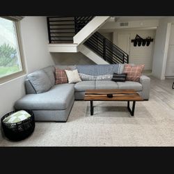 Living Spaces Grey sectional couch.  