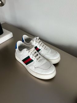 Gucci Re-Web sneaker in white, with the green-and-red Web stripe