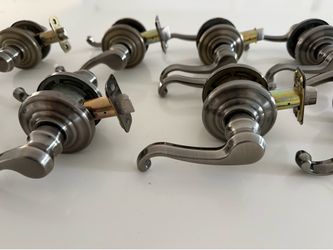 Schlage Callington Passage Levers in an Antique Pewter finish