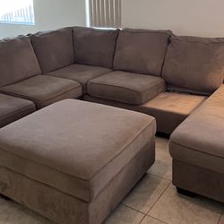 Brown Sectional With Storage Ottoman 