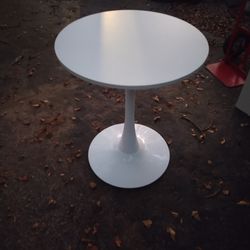 Small round white table