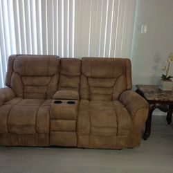 Brown Reclining Love seat and coffe Table