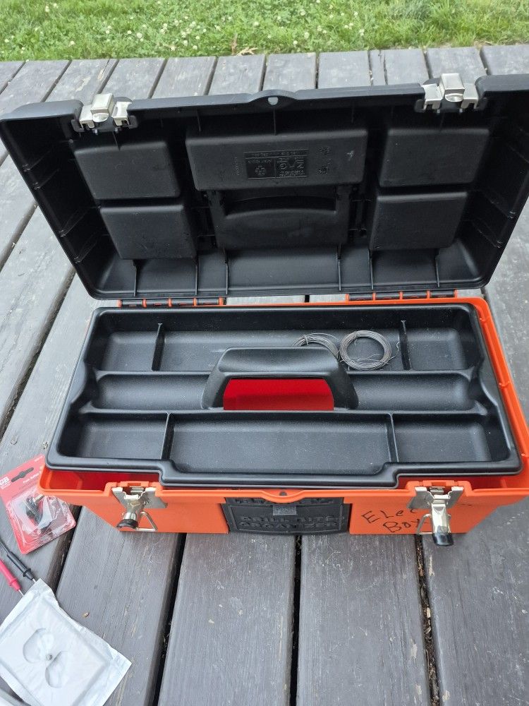 Plastic electric toolbox filled with electrical supplies