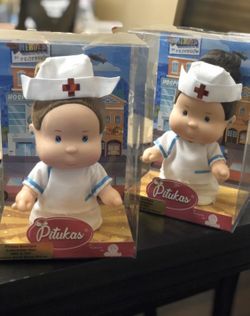 Adorable nurse Pituka doll.