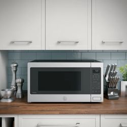 New GE Microwave Oven