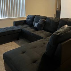 Black Microfiber Sectional Couch And Ottoman 