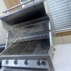 Turbo. Natural  Gas This grill has barely been used, maybe once or twice just dirty from being outside sitting over a year 