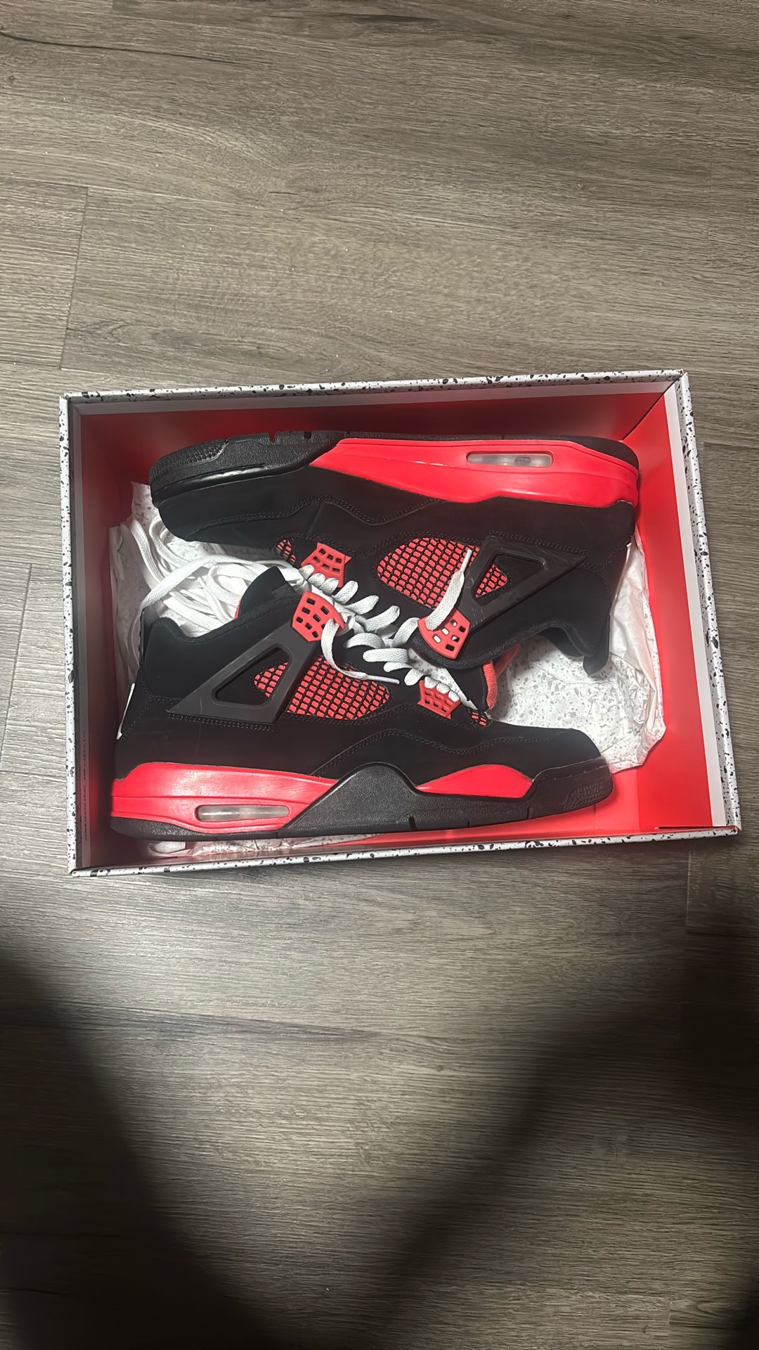 Red Thunder Jordan 4s
