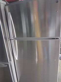 Kenmore stainless steel top and bottom apartment side fridge fully functional