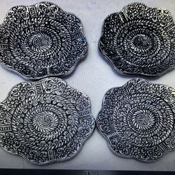 Set a four metal coasters with a really greats