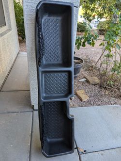 Chevrolet Silverado under rear seat storage 