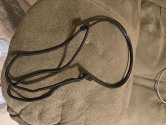 Black headband with attached hair elastic