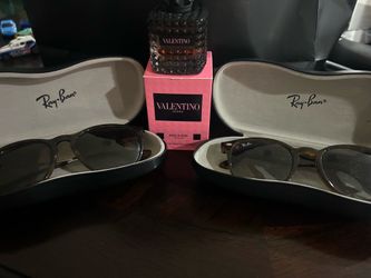 2 Ray Ban glasses
