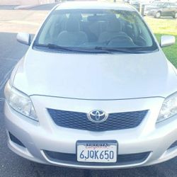 2010 toyota corolla clean title, smogged, runs exelent, automatoc, car fax
