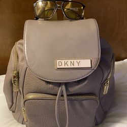 DKNY Backpack And Prada Shades