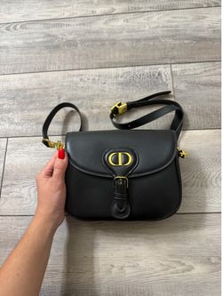 Christian Dior is with additional straps