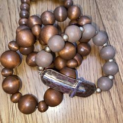 Bundle Of Brown Wood Bracelets With Cross