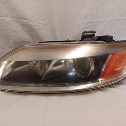 2007 Audi Q7 Drivers Side Headlight. Vin WA1EY74L67D052709. Stock # BA0418.   Normal Wear And Tear. Needs Buffing 