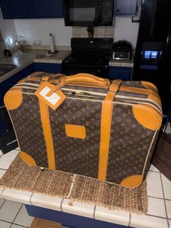 FOR SALE: Rolling Luggage Vintage