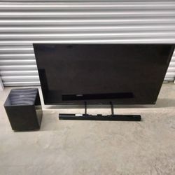 65in Samsung Smart TV With Sound Bar And Subwoofer And Roku Device 