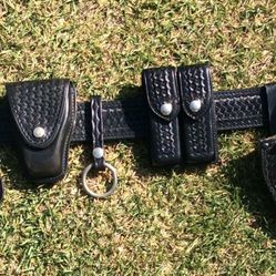 A Police Safariland  Duty Belt With Accessorys