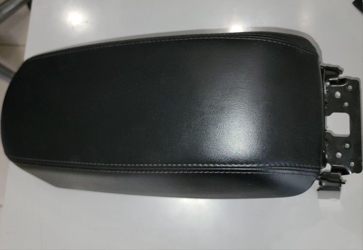 2014 to 2023 Jeep CHerokee Leather Armrest / Center Console Storage.