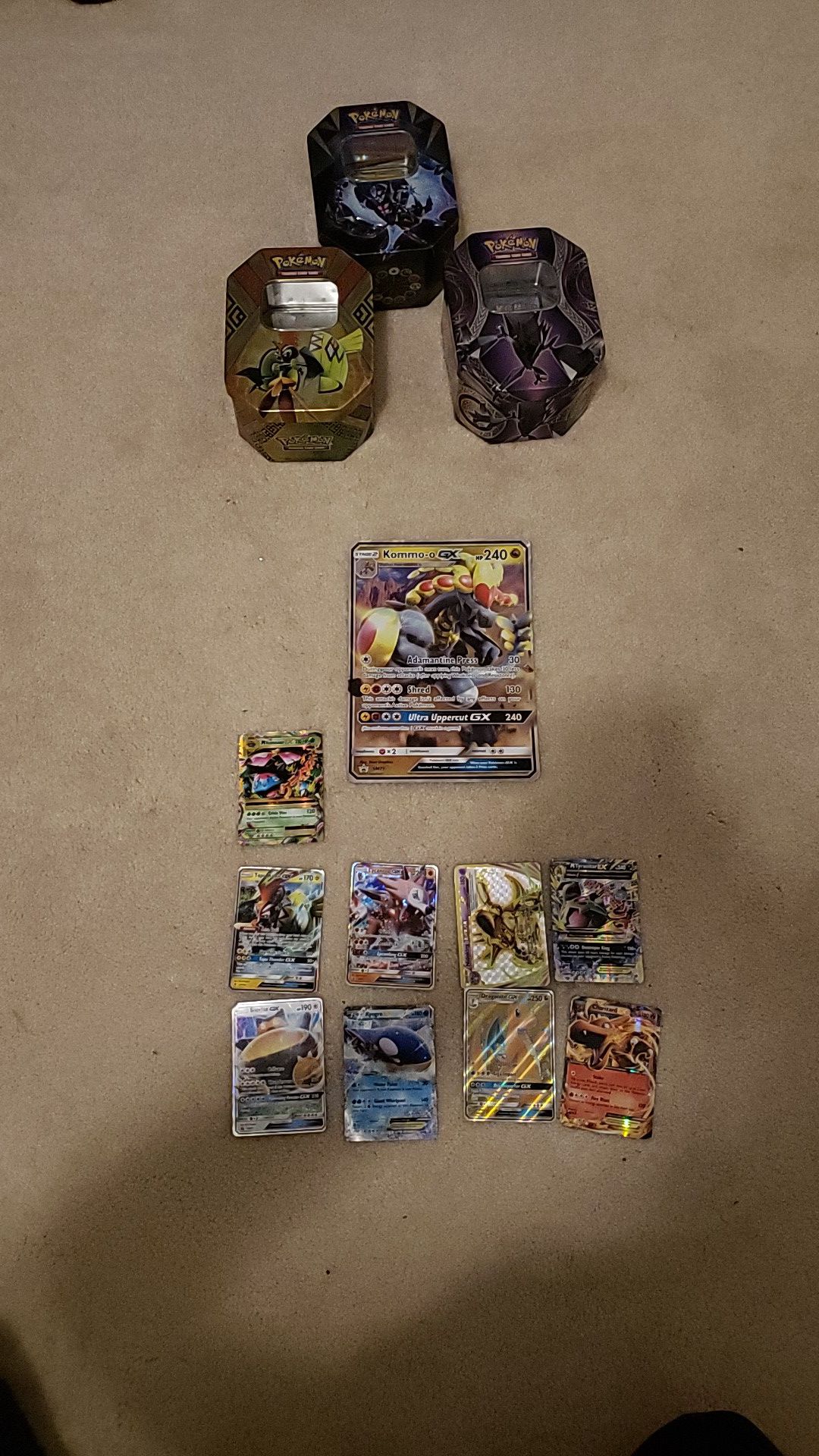 Ex and GX pokemon cards and 3 tins