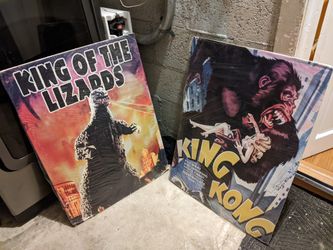 two old school movie posters